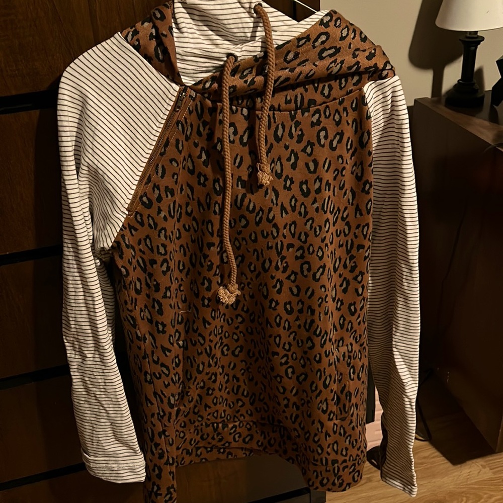 Comfy hooded sweatshirt from The Nines. Size medium w double hood, thumb holes.